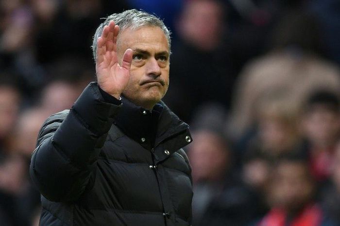 Manchester United's manager Jose Mourinho waves to fans following his side's 1-1 draw with Arsenal on November 19, 2016