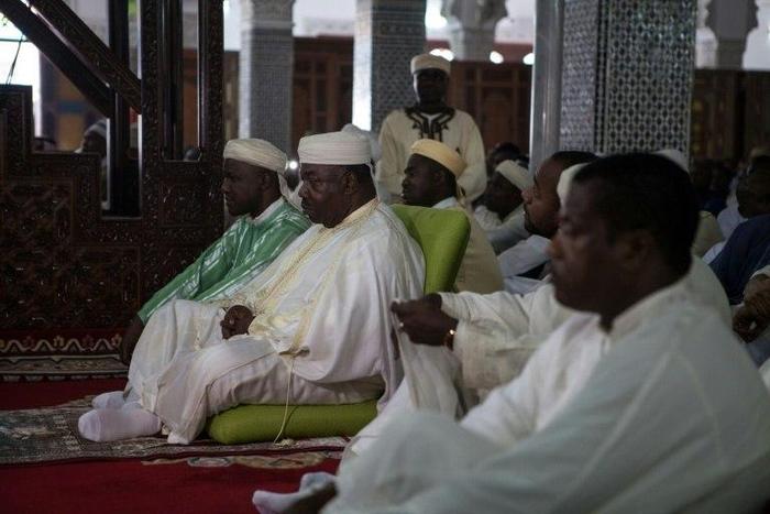 Incumbent Gabonese President Ali Bongo Ondimba attends prayers at the Assan II Mosque in Libreville on September 12, 2016