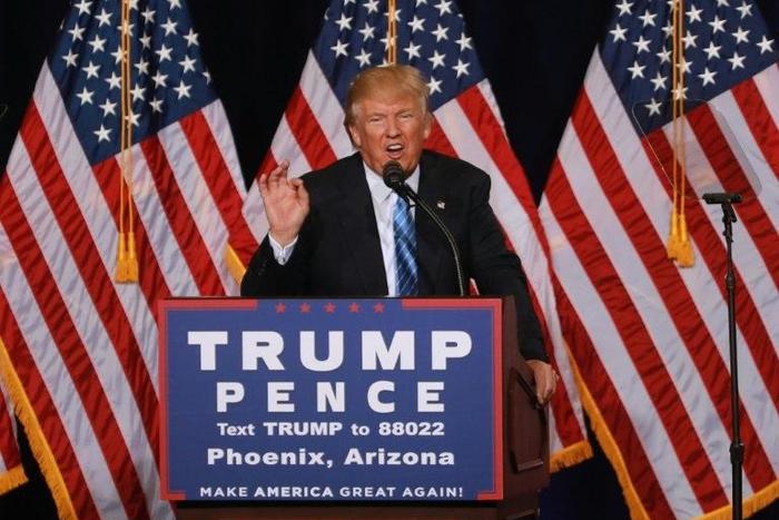 Republican presidential nominee Donald Trump unveils his 10-point plan to crack down on illegal immigration during a campaigm event in Phoenix, Arizona on August 31, 2016