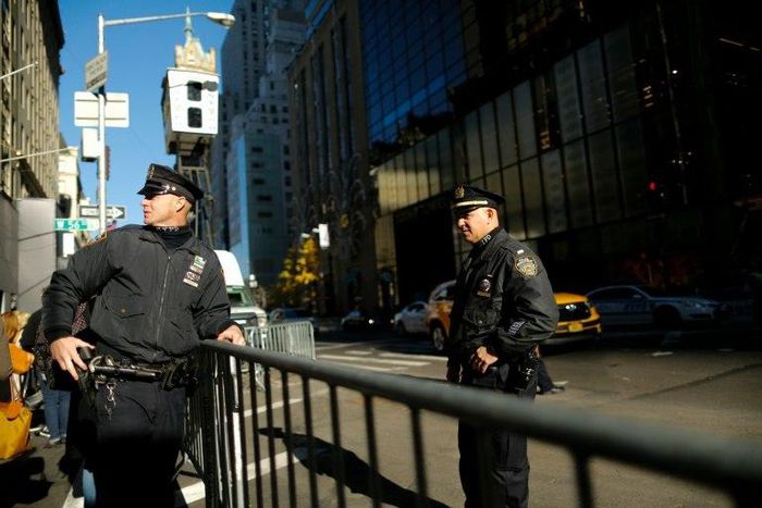 New York police patrol in front of Trump Tower in New York where Donald Trump has spent most of the time since his election causing havoc in the heart of the city