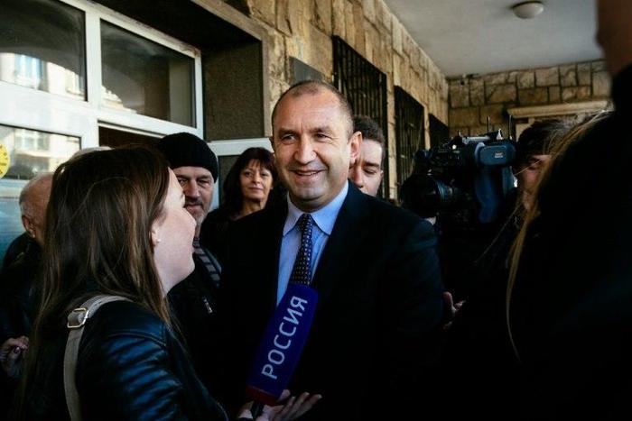 Former head of the Bulgarian airforce Rumen Radev, candidate of the opposition Socialists, talks to the media after voting in Sofia on November 13, 2016