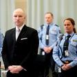 Norwegian mass killer Anders Behring Breivik, surrounded by prison guards, attends his fourth and last day in court in Skien prison, March 18, 2016