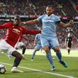 Stoke City's Erik Pieters in action with Manchester United's Paul Pogba