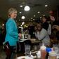 Democratic presidential nominee Hillary Clinton visits with customers at the Cedar Park Cafe on November 6, 2016 in Philadelphia, Pennsylvania