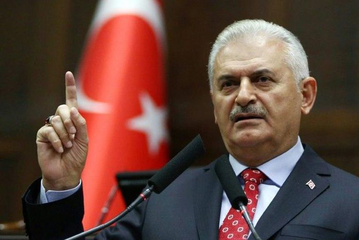 Turkish Prime Minister Binali Yildirim addresses a national assembly of the ruling Justice and Development Party (AK) in Ankara, on November 1, 2016