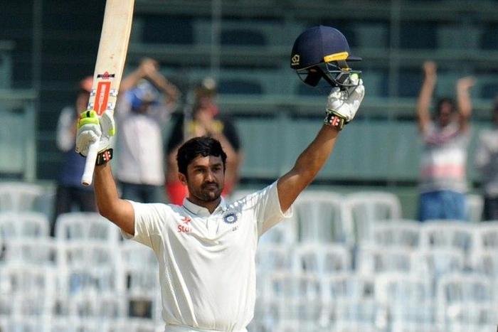 India's Karun Nair celebrates reaching his century on the fourth day of the fifth Test against England in Chennai on December 19, 2016