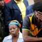 Victor Rethabile Mlotshwa reacts next to his mother after the appearance of Theo Martins and Willem Oosthuizen (not in picture), at the Middelburg magistrates high Court, in Mpumalanga province, South Africa, November 16, 2016. REUTERS/Siphiwe Sibeko