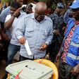 Ghanaian Presidential candidate Nana Akufo-Addo (C) of the opposition New Patriotic Party (NPP) casts his vote at a polling station in Kibi, eastern region of Ghana December 7, 2016. REUTERS/Luc Gnago