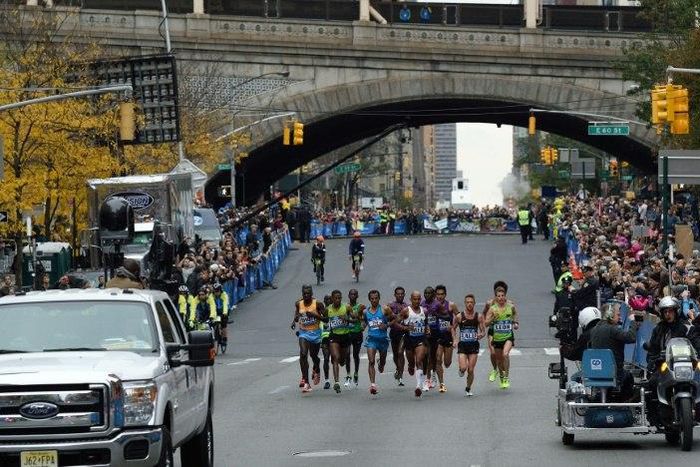 Men's elite runners run on First Aveue during the 2015 TCS New York City Marathon, on November 1