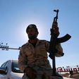 A member of Libyan forces loyal to eastern commander Khalifa Haftar holds a weapon at Zueitina oil terminal in Zueitina, west of Benghazi, Libya September 14, 2016.  