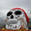 The Day of the Dead takes place between November 1-2 every year, when Mexicans visit cemeteries to pay respects to their late relatives, bringing them food and drinks in a centuries-old tradition mixing pre-Hispanic and Catholic beliefs