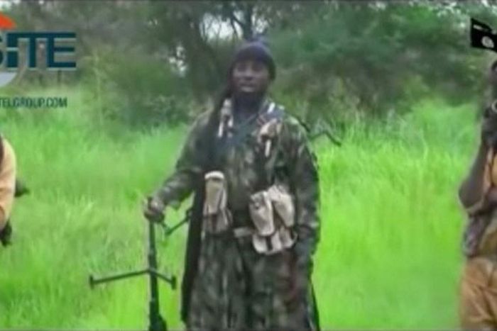 A man purporting to be Boko Haram's leader Abubakar Shekau (C) speaks in this still frame taken from social media video courtesy of SITE Intel Group. SITE INTEL GROUP/ via REUTERS TV