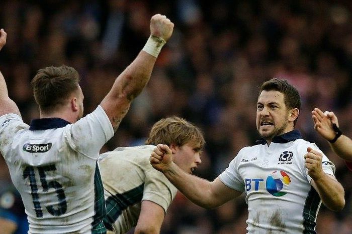 Scotland's full back Stuart Hogg (L) and captain and scrum half Greig Laidlaw celebrate being awarded a penalty during their Six Nations rugby union match against France, at Murrayfield in Edinburgh, in March 2016