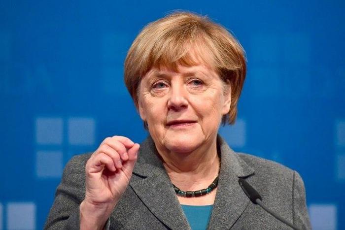 German Chancellor Angela Merkel addresses guests at a meeting of the Confederation of German Employers' Associations in Berlin on November 15, 2016