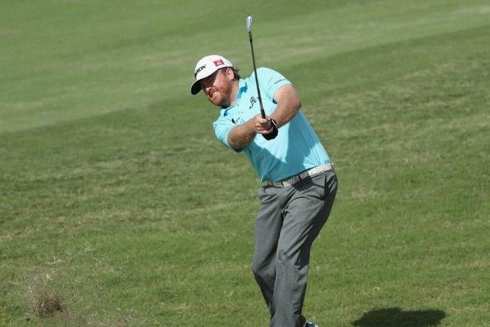 J.B. Holmes hits an approach shot on the first hole during round one of the Hero World Challenge at Albany, The Bahamas on December 1, 2016