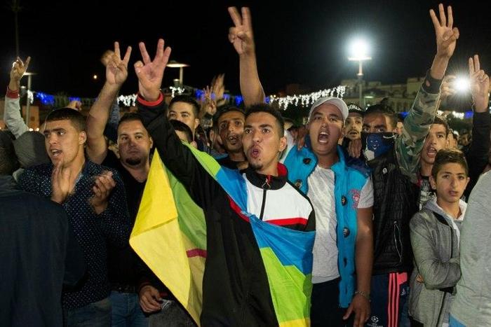 A protester wears the Berber flag in Al Hoceima, northern Morocco on October 30, 2016, following the death of fishmonger Mouhcine Fikri