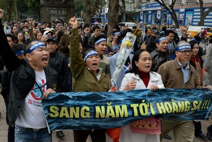 Activists chant anti-China slogans during a rally in Hanoi, Vietnam, on the anniversary of a 1988 battle in the Spratly Islands