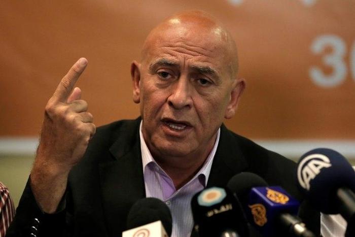 Basel Ghattas faces an accusation he smuggled mobile phones to Palestinian prisoners