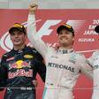 Nico Rosberg (C) roared to victory at Japan Grand Prix with Hamilton (R) trailing in third, stretching his lead to 33 points with only four races left this season