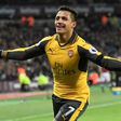 Arsenal's striker Alexis Sanchez celebrates after scoring their second goal during the English Premier League football match against West Ham United December 3, 2016