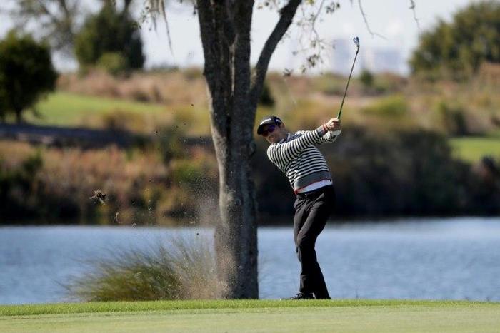 Camilo Villegas of Colombia plays his second shot on the 7th hole during the final round of the RSM Classic November 20, 2016 in Georgia