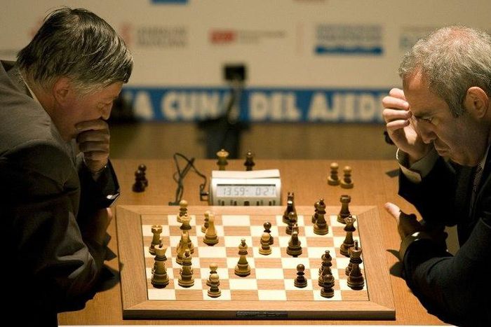 Chess legends Garry Kasparov (right) and Anatoli Karpov play chess in Valencia, Spain, in September 2009, 25 years after their epic world championship duel