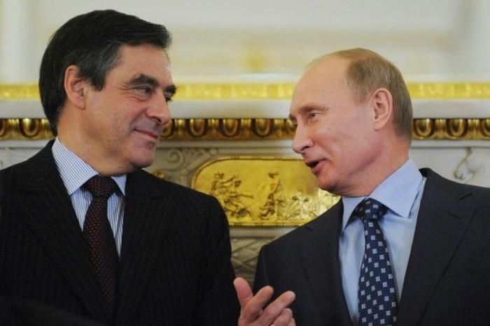 Francois Fillon (left) with Vladimir Putin in Moscow in 2011