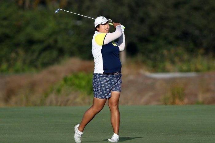 Shanshan Feng of China plays her second shot on the 18th hole during the first round of the CME Group Tour Championship at Tiburon Golf Club on November 17, 2016 in Naples, Florida