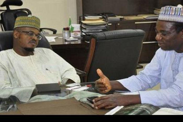 Dr Isa Ali Ibrahim (Pantami), director general, National Information Technology Development Agency (NITDA), listening to attentively to a point being stressed by Professor Raufu Adebisi, director general, Nigeria French Language Village, who led a dele...