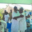 Akeredolu in a warm embrace with guests