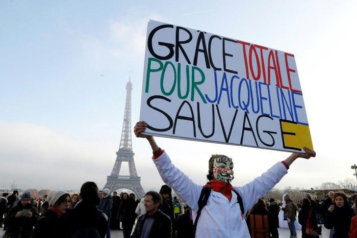 French protester Jean-Baptiste Redde calls for the release of Jacqueline Sauvage duing a rally at the Esplanade du Trocadero in Paris, on December 10, 2016