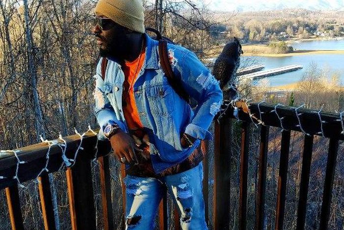 Jim Iyke in ripped denim