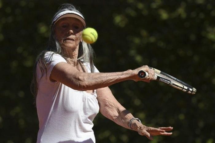 Senior tennis player Ana Obarrio, 83, hits the ball during a tennis match in Hurlingham, Buenos Aires