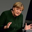 German Chancellor Angela Merkel gestures as she gives a speech during a session at the Bundestag in Berlin, on November 23, 2016