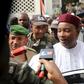 Niger's incumbent President Mahamadou Issoufou speaks to journalists after voting during the country's presidential and legislative elections in Niamey, Niger, February 21, 2016. REUTERS/Joe Penney