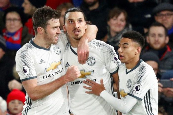 Manchester United's striker Zlatan Ibrahimovic (2L) celebrates scoring their second goal with teammates during the English Premier League football match between Crystal Palace and Manchester United at Selhurst Park on December 14, 2016