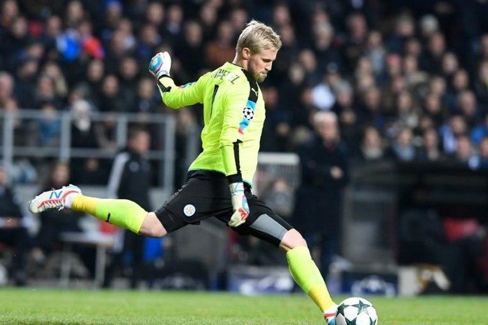 Leicester City's Danish goalkeeper Kasper Schmeichel passes the ballduring the UEFA Champions League group G football match between FC Copenhagen and Leicester City FC at the Telia Parken stadium in Copenhagen on November 2, 2016