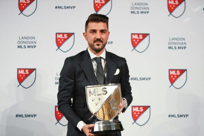 David Villa of New York City FC poses for a photo with the 2016 Landon Donovan MLS MVP trophy at Spring Studios on December 6, 2016 in New York City