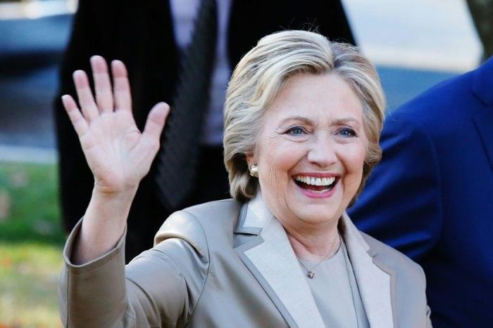 Democratic presidential nominee Hillary Clinton greets supporters after casting her vote in Chappaqua, New York, on November 8, 2016