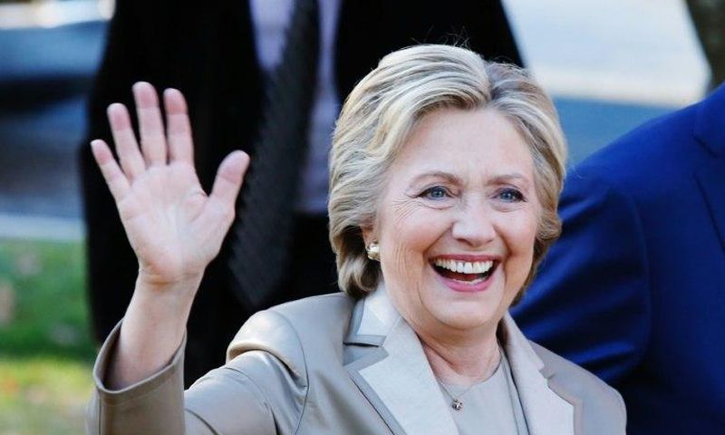 Democratic presidential nominee Hillary Clinton greets supporters after casting her vote in Chappaqua, New York, on November 8, 2016