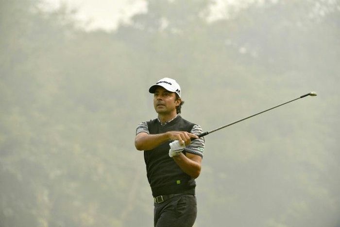 Jyoti Randhawa of India plays a shot during round one of the Panasonic Open India at the Delhi Golf Club in New Delhi