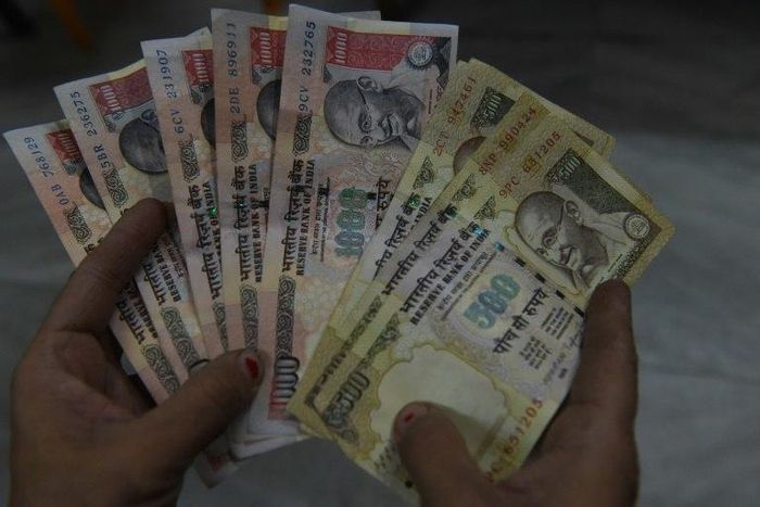 The 500 and 1000 rupee ($7.50, $15) bills -- amount to 85 percent of the cash in circulation across India
