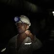A mine worker is seen underground  at Lonmin's Karee mine in Rustenburg, 100 km (62 miles) northwest of Johannesburg, March 5, 2013.   REUTERS/Siphiwe Sibeko