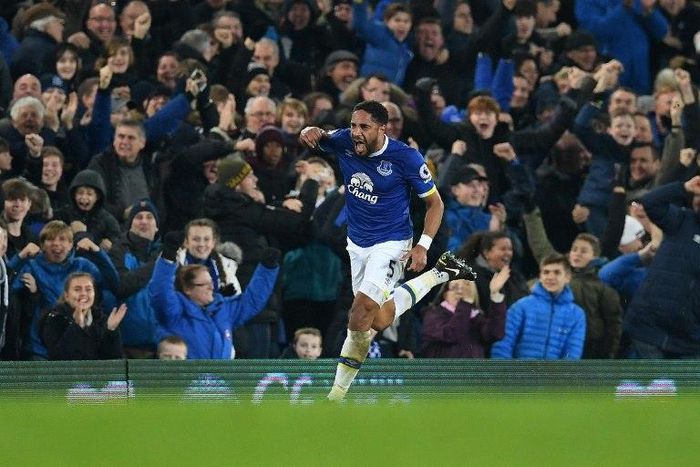 Everton's English-born Welsh defender Ashley Williams celebrates scoring his team's second goal during the English Premier League football match between Everton and Arsenal at Goodison Park in Liverpool, north west England on December 13, 2016