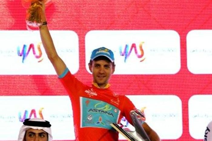 Estonian rider Tanel Kangert celebrates on the podium after winning the Abu Dhabi Tour on October 23, 2016
