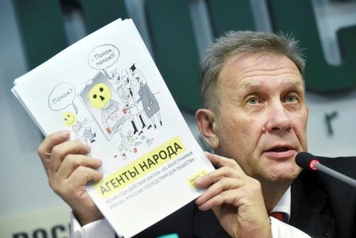 Amnesty's Russia director Sergei Nikitin speaks at a press conference in Moscow on November 18, 2016