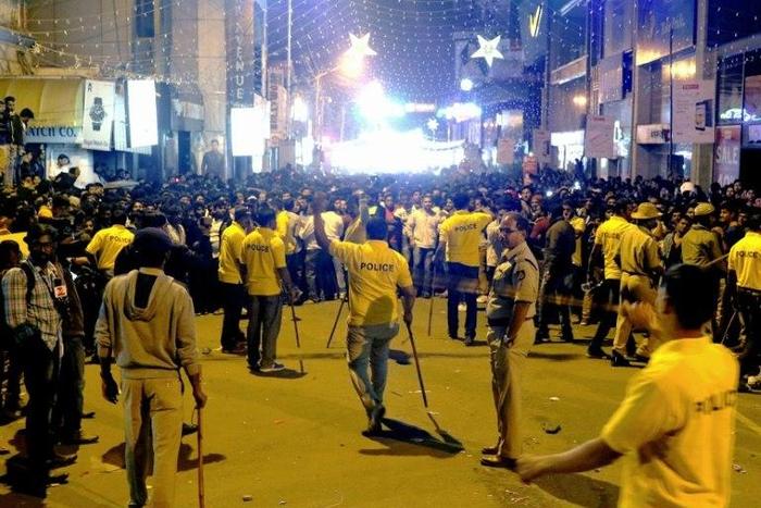 Indian police have set up an inquiry into allegations that women in Bangalore were molested after viewing footage from CCTV cameras
