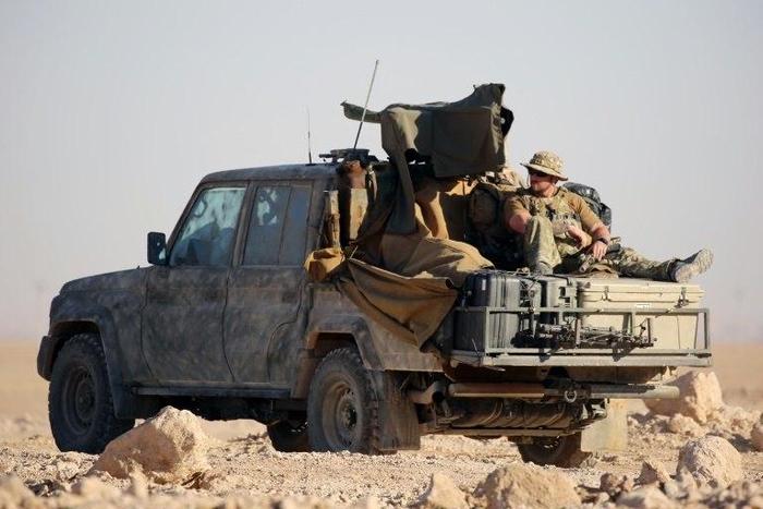 Western special forces, supporting the US-backed Kurdish-Arab forces, deploy on the frontline on November 6, 2016, as they launch an offensive on the Islamic State group's positions