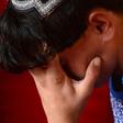 An Afghan boy, who was held as a child sex slave, sits at a restaurant in a unidentified location in Afghanistan