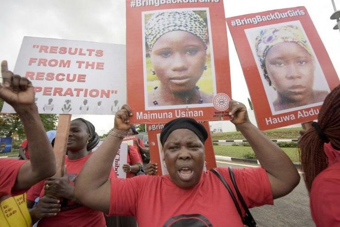 Members of the "Bring Back Our Girls" movement press for the release of the missing Chibok schoolgirls in Lagos, in April 2016 